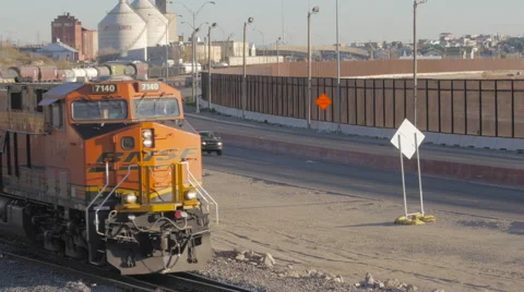 Train Rolls Along the Border Highway Video stock 60131048