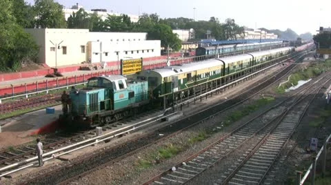 Train rolls out of a station in India 動画素材 11016937