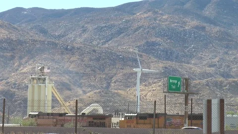 Train Rolls Past Windmill 스톡 동영상 82846684