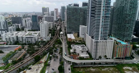 Train running around downtown Miami Stock Footage 149094346