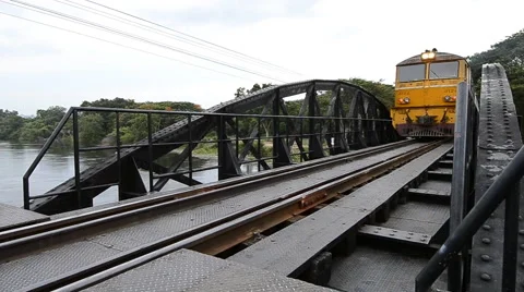 Train running on old iron bridge history railway of Kanchanaburi, thailand Stock Footage 41416920