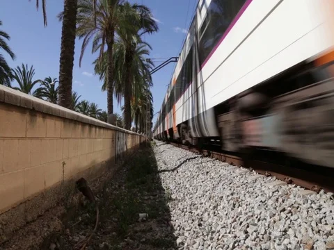 Train running on sunny day Stock Footage 80356086