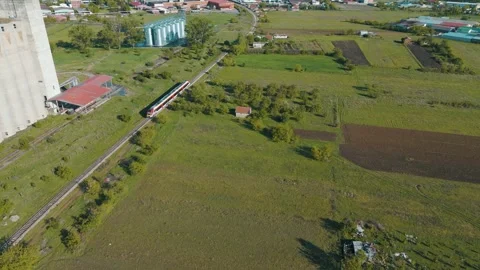 Train Running Through Green Valley 스톡 동영상 274754780