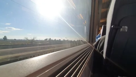 Train running through Madrid, Spain. Train window. Traveling by train. Stock Footage 224871657