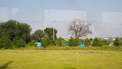Train running window scenery field Stock Footage 210850438