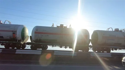 The train runs along the road Stock Footage 98307825