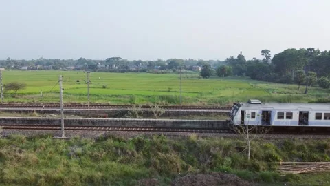 A train runs through nature. Видео 331655180