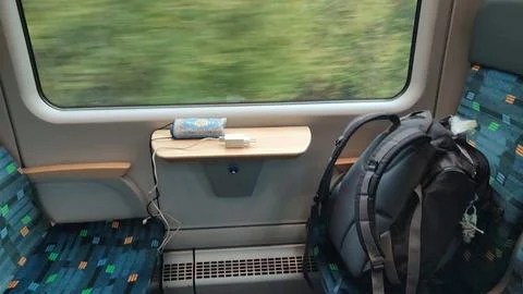 Train seat backpack table objects furniture shotlisttravel travel tourism t.. Stock Photos