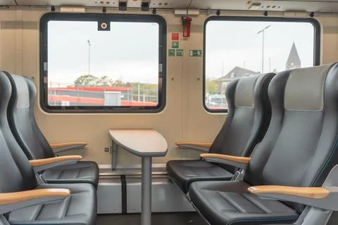 Train seats with table. Stock Photos