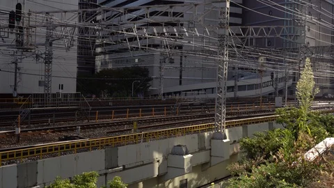 Train is seen on Osaka Loop line heading to Osaka Station Stock Footage 98991955