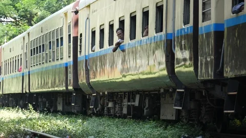 Train in Shan State runs in slowmotion, Burma, Asia in 4K Stock Footage 94883011