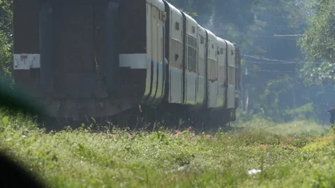 Train in Shan State runs in slowmotion, Burma, Asia in 4K Stock Footage 94883235
