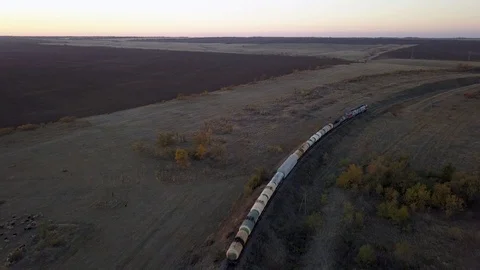 Train shot in motion with a bird's eye view Stock Footage 98096816