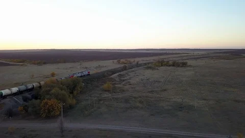Train shot in motion with a bird's eye view Stock Footage 98097015