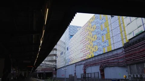A train is sitting on the tracks with its windows open Stock Footage 297859392