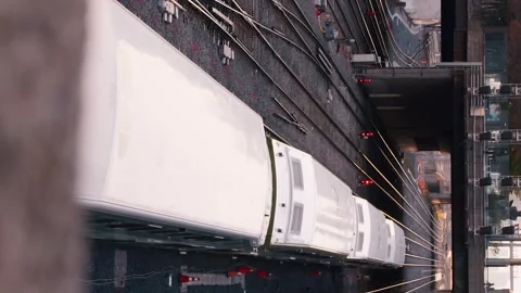 Train slowly emerges from bridge multi-track New York. steady pace symbolizes Stock Footage 262747006