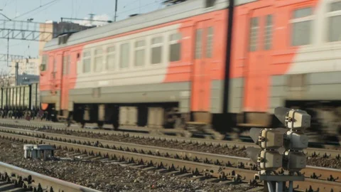Train slows down on the way to the station Stock Footage 125088939