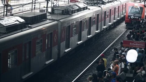 Train Speeding Along the Tracks at Luz metro station in Sao Paulo, Brazil Stock Footage 265099764