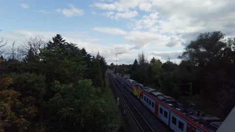 A train speeding by - View from above Stock Footage 164258323