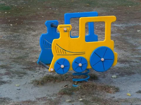 Train spring rider  in  a Playground Stock Photos