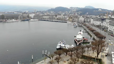 Train Station And the Chapel Bridge (Kappelbrücke) Lucerne, Switzerland Stock Footage 122080996