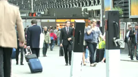 Train station and commuters Stock Footage 12418685
