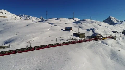 Train station on Bernina Pass, winter landscape. Bernina Express Stock Footage 83443492