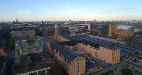 Train station, C4k aerial sideway view of helsinki railway station, on a sunn Stock Footage 91280256