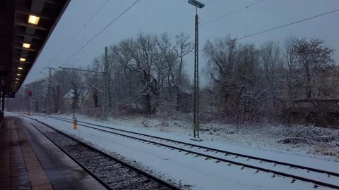 Train Station, Empty Platform, Cold Snow Winter Day, Pan Shot Stock Footage 256043023