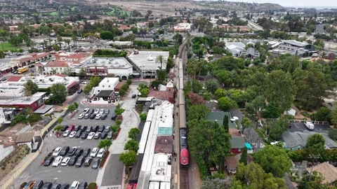 Train Station loading passengers onto the Orange County Metrolink Stock Footage 336221117