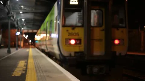 Train at station at night Stock Footage 22307544