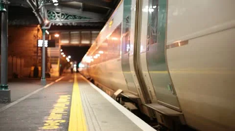 Train at station at night Stock Footage 22307673