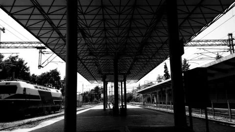 Train station platform captured in black and white Stock Photos