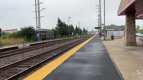Train Station Platform on a Rainy Day Stock Footage 250205952