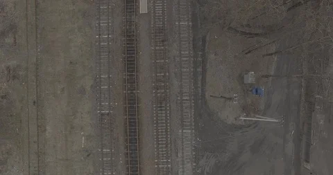Train Station Rail Ways Mountains Aerial Panorama 4K Stock Footage 86700469