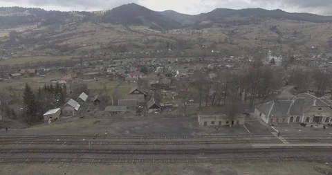 Train Station Rail Ways Mountains Aerial Panorama 4K Video stock 86700686