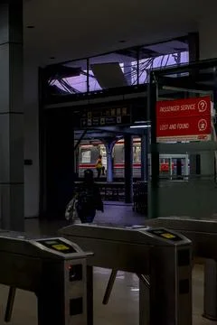 Train Station Security Guard Doing Their Job in the Evening Stock Photos