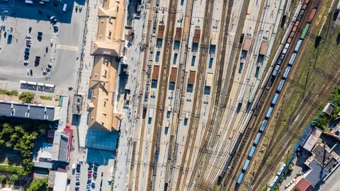 Train station top view of trains and people hyperlapse from drone Stock Footage 114141034