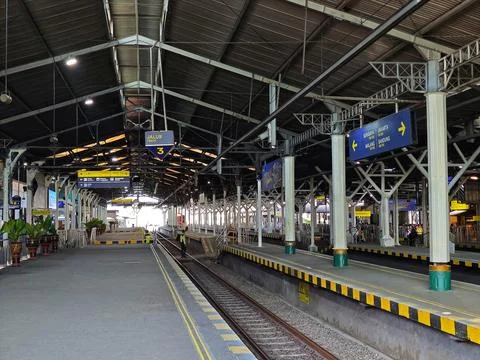 Train station where the train stops for passengers to get on and off. Stock Photos