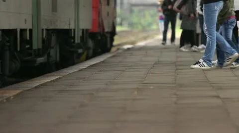 Train stop with waiting people Stock Footage 11881347