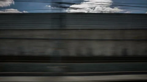 Train stopping at station platform for commuters Stock Footage 50076489