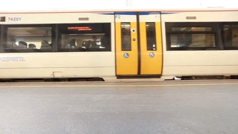 Train stopping at the stop 스톡 동영상 76388098