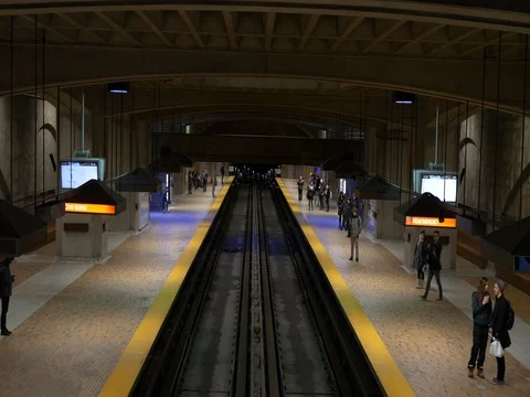 Train stops at the metro station then leaves Stock Footage 74771334