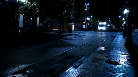 Train stops at station at night - Public transportation Stock Footage 22732177