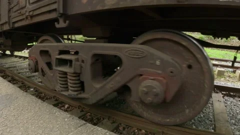 Train stops. Wagon wheels and platform. Old train stopped at station Stock Footage 178946377