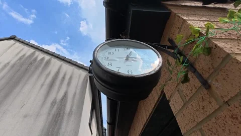 Train Style Clock Close Up On Outdoor Table With Railway Station Look Stock Footage 338128602