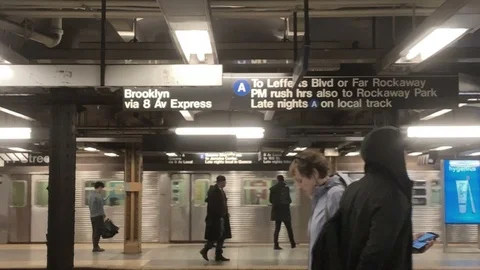 A train subway platform sign for Brooklyn people in station New York City NYC Stock Footage 108197740
