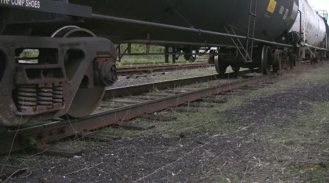 Train tanker pan highlighting wheels on tracks Stock Footage 507906
