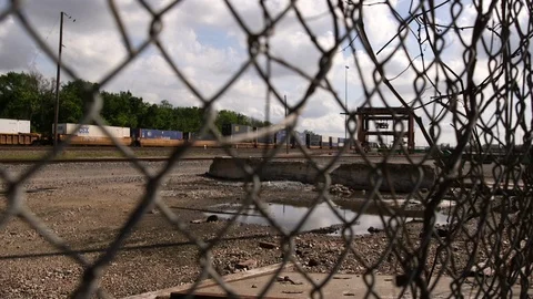 Train through Fence Stock Footage 89287930