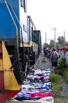 Train through a market Stock Photos